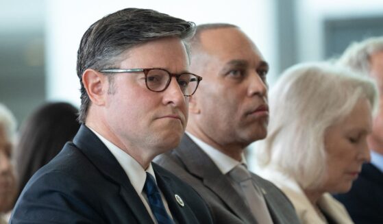 Speaker of the House Mike Johnson and House Minority Leader Hakeem Jeffries attend the United States Holocaust Memorial Museum's National Commemoration of the Days of Remembrance ceremony at the U.S. Capitol in Washington, D.C., on April 14, 2026.