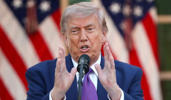 President Donald Trump delivers remarks at a "Rose Garden Club" dinner for National Police Week in the Rose Garden at the White House on May 11, 2026, in Washington, D.C.