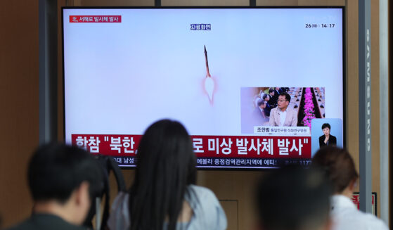 A TV screen shows a reporting of North Korea's unidentified projectile with file footage during a news program at the Seoul Railway Station in Seoul, South Korea, on May 26, 2026.