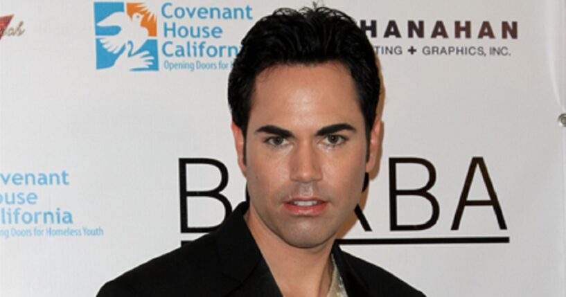 Scott Vincent Borba poses in a 2011 file photo at a launch party for his book "Skintervention" in Los Angeles.