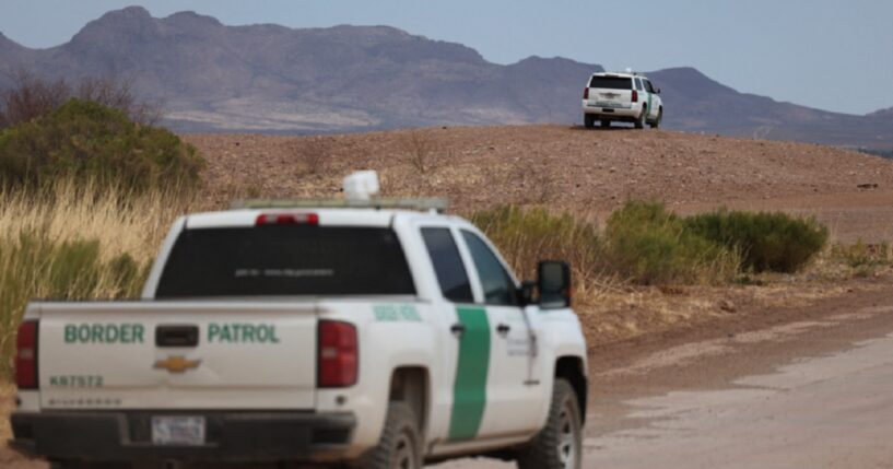 Border Patrol vehicles are pictured along the fence at the U.S. border with Mexico, in Douglas, Arizona, in an April 2025 file photo.