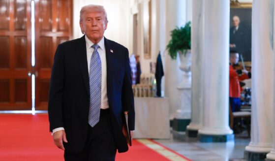 President Donald Trump, heading into a meeting in the East Room of the White House on Monday.