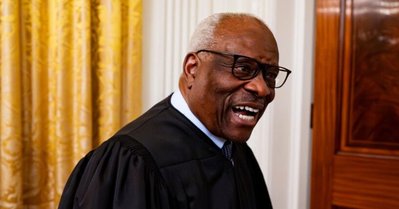 Associate Supreme Court Justice Clarence Thomas, seen in a May 22 photo, chuckled at a reporter's persistent questions Monday, but declined to answer.