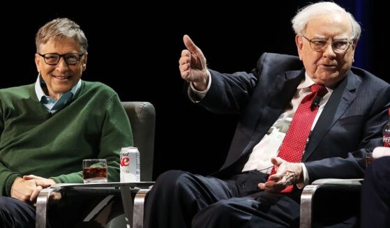 Billionaire Warren Buffett, right, pictured with Bill Gates in a 2017 photo, has delayed his annual gift to the Gates Foundation pending a report on whether the organization had links to Jeffrey Epstein and, if so, how extensive they were.