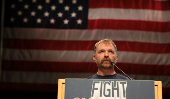 Democratic U.S. Senate candidate Graham Platner of Maine speaks May 24 at a “Fighting Oligarchy” tour stop held by Vermont Sen. Bernie Sanders in Orono, Maine.