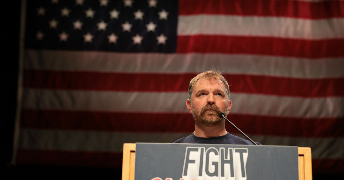 Democratic U.S. Senate candidate Graham Platner of Maine speaks May 24 at a “Fighting Oligarchy” tour stop held by Vermont Sen. Bernie Sanders in Orono, Maine.