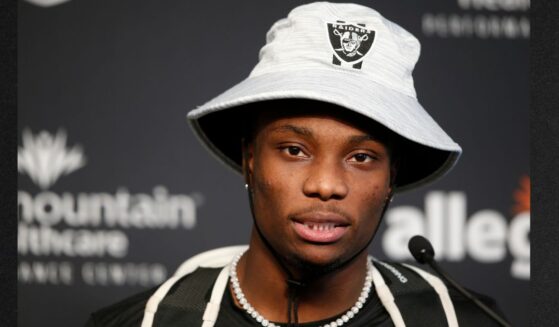 Henry Ruggs III speaks with reporters at the Las Vegas Raiders Headquarters in Henderson, Nevada, in a file photo dated July 28, 2021, a few months before the deadly DUI crash that killed a woman and sidelined his career.
