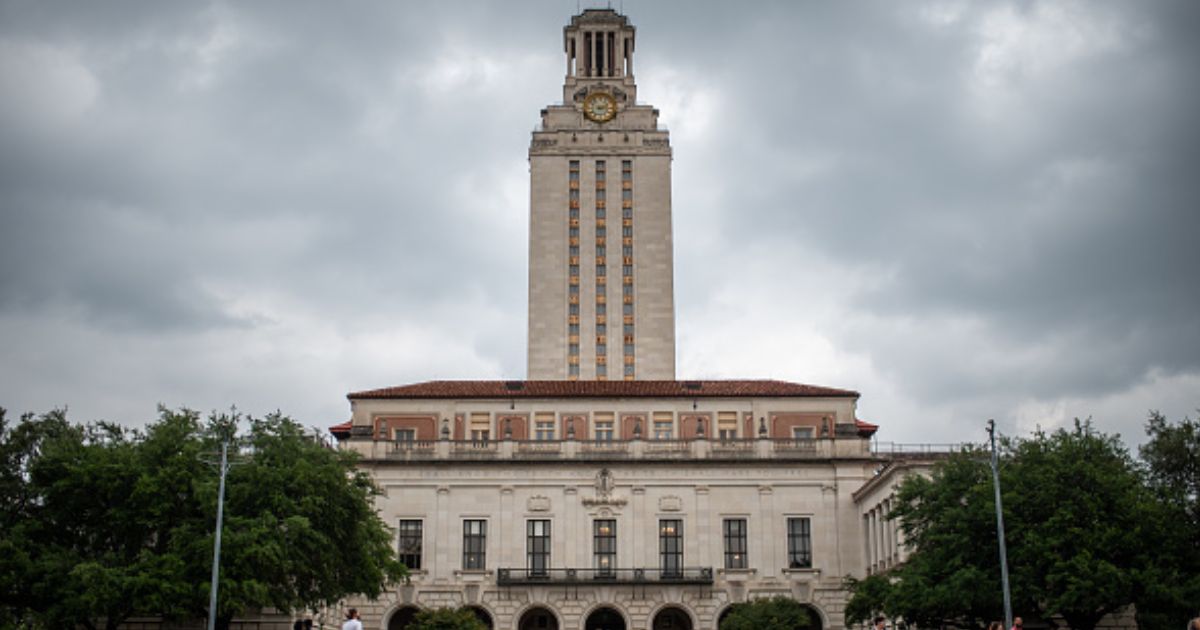 The University of Texas stands behind stormy skies in Austin, Texas on April 26, 2024.