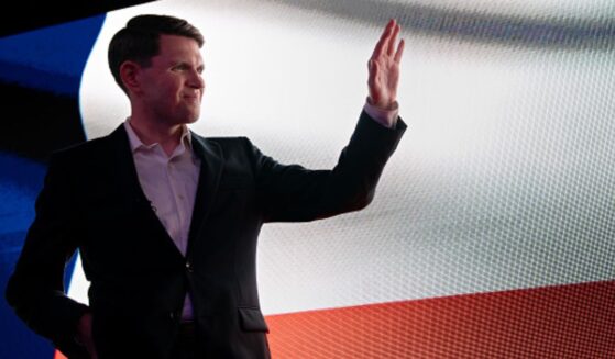 Texas Senate Candidate James Talarico waves to a crowd at Houston, Texas on a campaign stop.