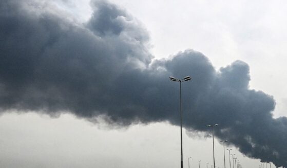 Smoke rises from near the Kuwait International Airport after a reported drone strike on March 25, 2026.