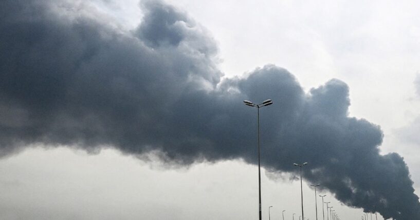 Smoke rises from near the Kuwait International Airport after a reported drone strike on March 25, 2026.
