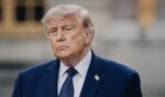 President Donald Trump poses and raises a fist after arriving to a dinner with the President of the French Republic at the Chateau de Versailles in Versailles France on June 17, 2026.