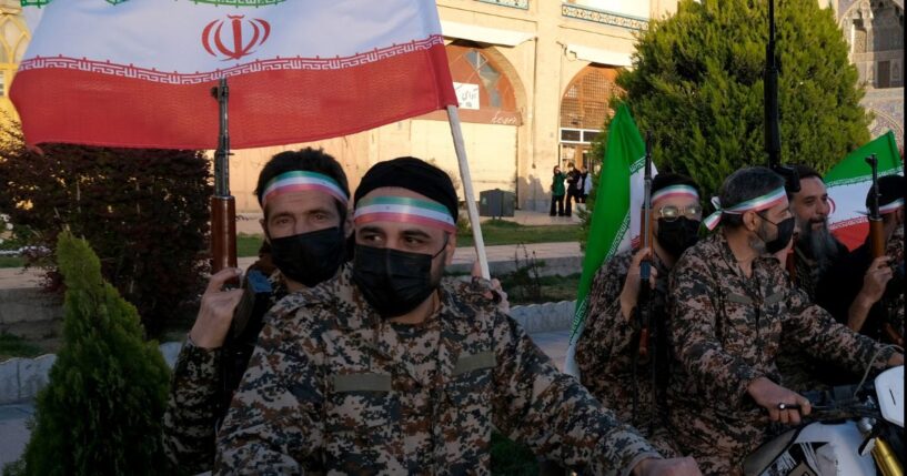 A group of militia members in Iran wear fatigues and celebrate the regime leader's birthday on April 29, 2026 in Isfahan, Iran.