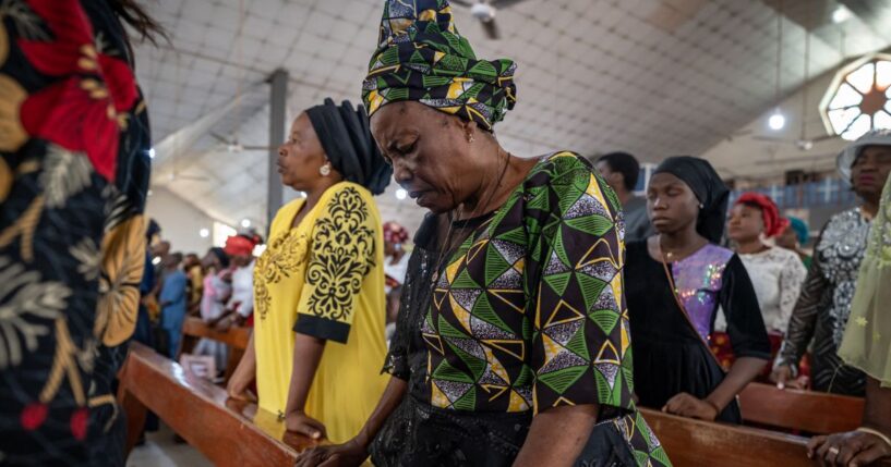 Catholic Nigerians pray in Saint Michael's Cathedral during a Sunday service in Minna, Nigeria on Nov. 30, 2025.