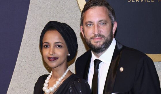 Minnesota Democratic Rep. lhan Omar, left, and Tim Mynett are seen in a file photo attending the Congressional Black Caucus Foundation Annual Legislative Conference Phoenix Awards on Sept. 23, 2023, in Washington, D.C.