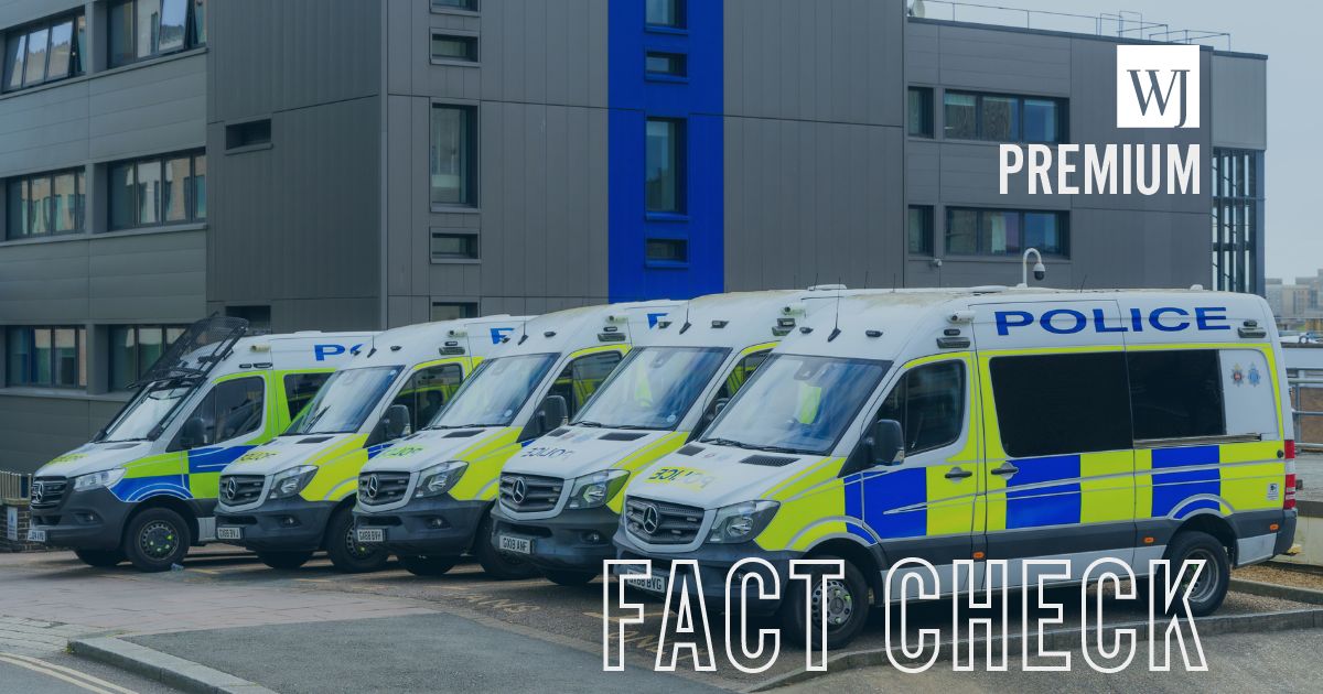 Police vans parked in a row outside Brighton police station in East Sussex in southeast England on May 12, 2026.