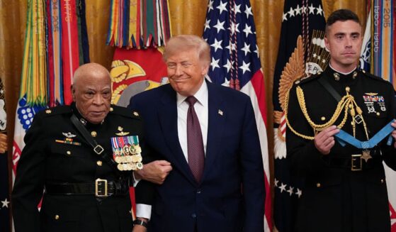 Retired Marine Maj. James Capers Jr. stands with President Donald Trump before he is presented the Medal of Honor Thursday at the White House in Washington, D.C.