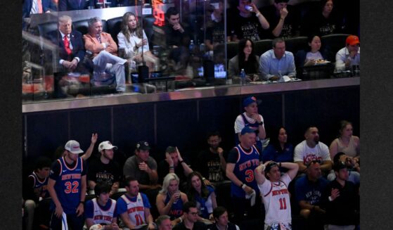 President Donald Trump sits next to Knicks owner James Dolan Monday as they attend Game Three of the NBA Finals between the San Antonio Spurs and the New York Knicks at Madison Square Garden in New York City.