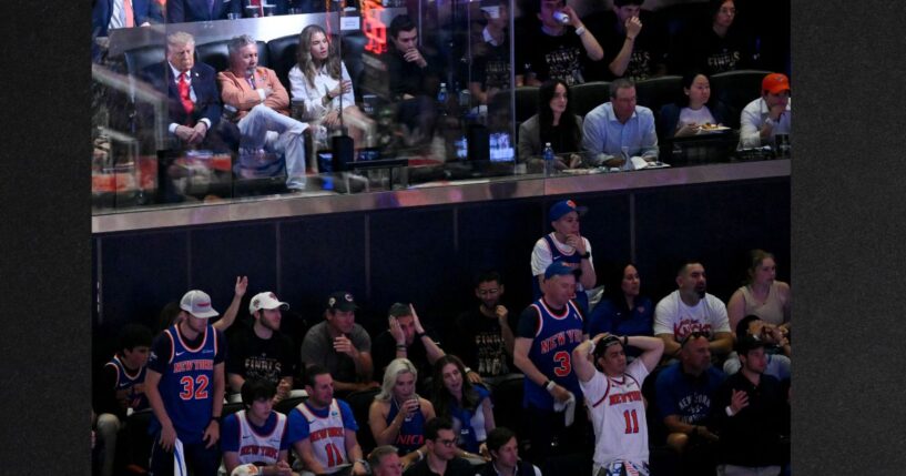 President Donald Trump sits next to Knicks owner James Dolan Monday as they attend Game Three of the NBA Finals between the San Antonio Spurs and the New York Knicks at Madison Square Garden in New York City.