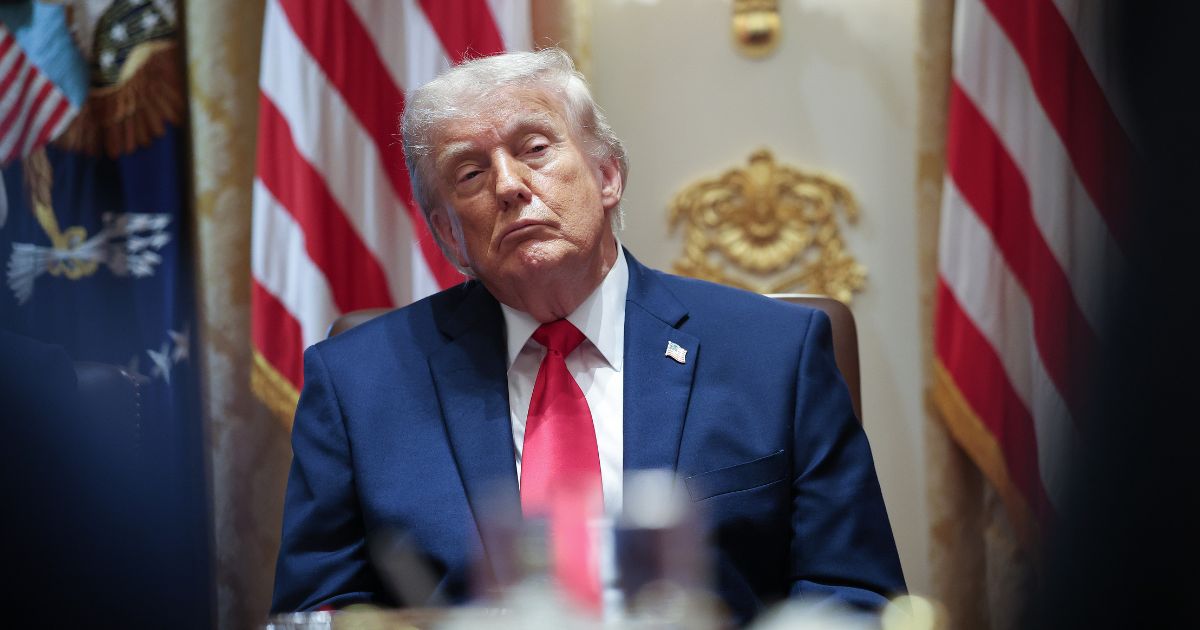 President Donald Trump listens to members of his Cabinet speak during a meeting in the Cabinet Room of the White House on May 27, 2026, in Washington, D.C.