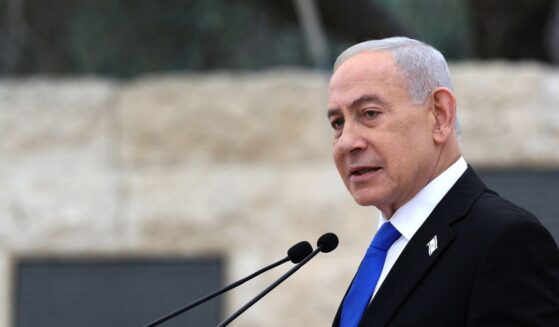 Israeli Prime Minister Benjamin Netanyahu speaks during a ceremony commemorating Israel's Remembrance Day for fallen soldiers, or Yom HaZikaron, at the Military Cemetery on Mount Herzl in Jerusalem on April 21, 2026.