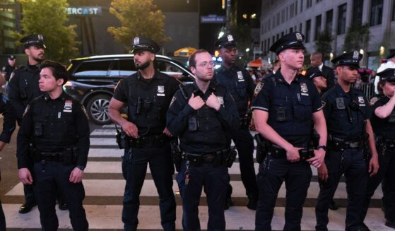 NYPD monitors Knicks fans celebrating winning the eastern conference championship against the Cleveland Cavaliers on May 25, 2026, in New York City.