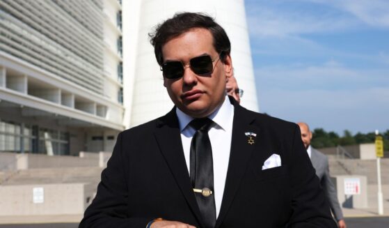 Former Rep. George Santos prepares to give a statement after a court hearing on Aug. 19, 2024, in West Islip, New York.