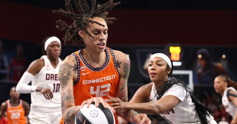 Brittney Griner of the Connecticut Sun drives against Angel Reese of the Atlanta Dream during the first quarter at Gateway Center Arena on June 2, 2026, in College Park, Georgia.