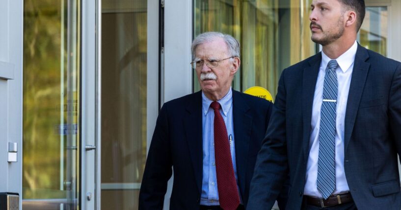 Former U.S. National Security Advisor John Bolton leaves federal court after pleading not guilty to charges of mishandling classified material on Oct. 17, 2025, in Greenbelt, Maryland.