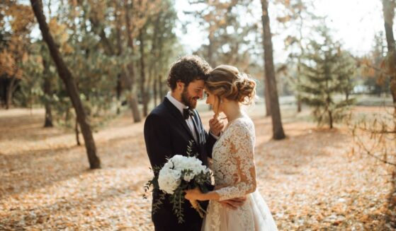 A beautiful couple in a park.