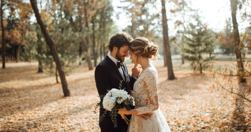 A beautiful couple in a park.