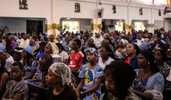 Roman Catholics gather for a mass at the Church of the Assumption in Lagos, Nigeria, on April 21, 2025.