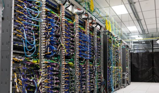 Wires from Amazon Web Services Trainium3 UltraServers are seen at a QA lab in Austin, Texas, on Feb. 3, 2026.