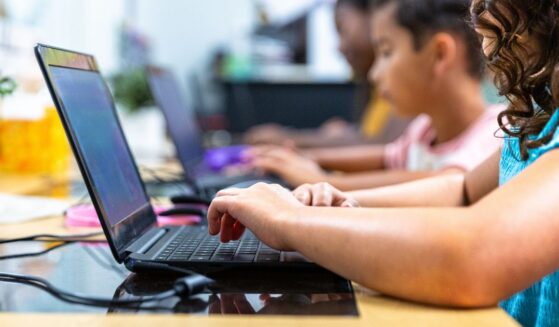 Elementary school students in a computer lab.