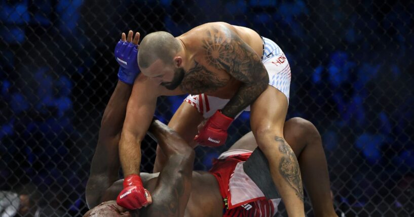 Josh Hokit of the United States lands a punch on Derrick Lewis of the United States during UFC Freedom 250 at the White House on June 14, 2026, in Washington, D.C.