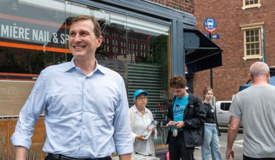 Rep. Dan Goldman greets voters outside a polling station in Manhattan's West Village on June 23, 2026, in New York City.