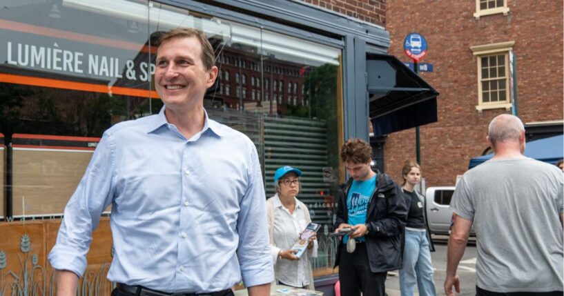 Rep. Dan Goldman greets voters outside a polling station in Manhattan's West Village on June 23, 2026, in New York City.