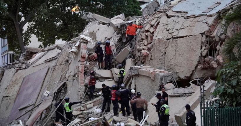 Rescuers search for victims in a collapsed building following an earthquake in Caracas, Venezuela, on June 24, 2026.