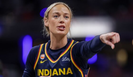 Sophie Cunningham of the Indiana Fever points during the game against the Phoenix Mercury at Gainbridge Fieldhouse on June 22, 2026, in Indianapolis, Indiana.