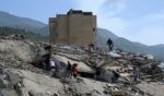 Volunteers search for possible victims amid the rubble following a twin earthquake in Caraballeda, La Guaira state, about 40 km northeast of Caracas, on June 25, 2026.