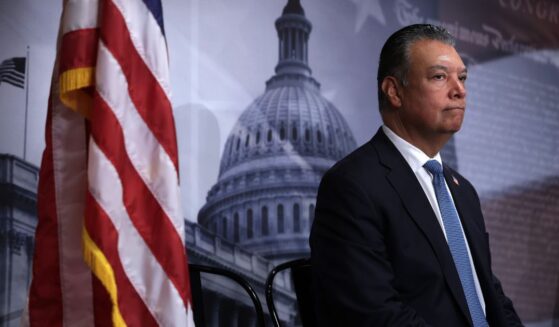 Sen. Alex Padilla listens during a news conference to introduce the Protect our Polls Act at the U.S. Capitol on June 18, 2026, in Washington, D.C.