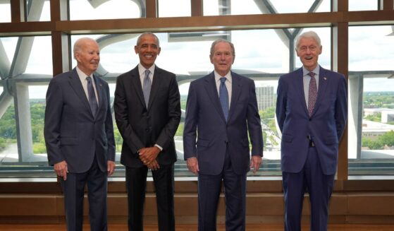 Former President Joe Biden, former President Barack Obama, former President George W. Bush, and former President Bill Clinton pose ahead of the dedication ceremony for the opening of the Barack Obama Presidential Center, in John Lewis Plaza, on June 18, 2026, in Chicago, Illinois.