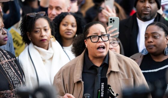 St. Paul Public School board member and activist Chauntyll Allen speaks with media gathered after an arraignment hearing at the Warren E. Burger Federal Building and U.S. Courthouse on Feb. 13, 2026, in St. Paul, Minnesota.