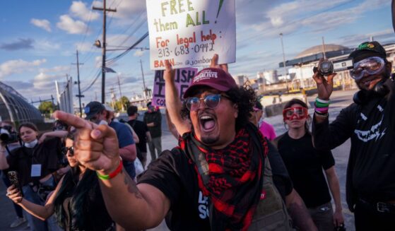 Protesters shout at ICE agents outside the Delaney Hall Immigration Detention Center on June 7, 2026, in Newark, New Jersey.