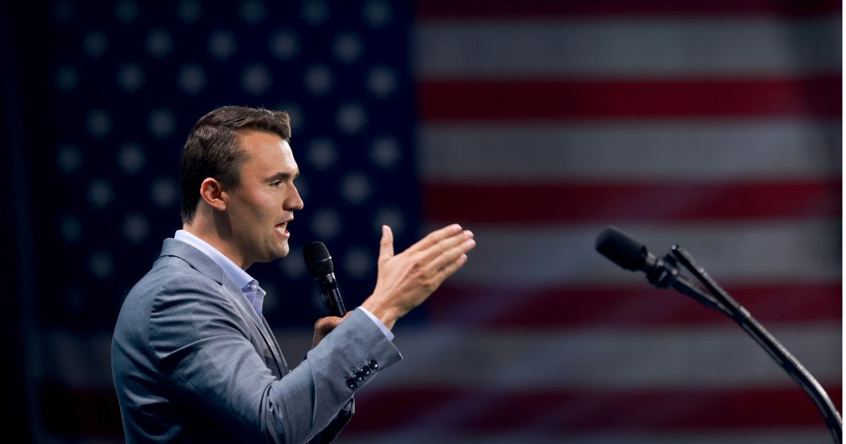 Charlie Kirk, who founded Turning Point USA, speaks before former President Donald Trump's arrival during a Turning Point USA Believers Summit conference at the Palm Beach Convention Center on July 26, 2024, in West Palm Beach, Florida.