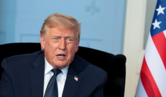 President Donald Trump talks as he meets French President Emmanuel Macron for a bilateral meeting at Hotel Royal Evian on June 15, 2026, in Évian-les-Bains, France.
