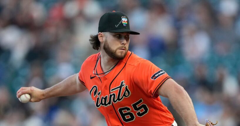 Landen Roupp of the San Francisco Giants pitches against the Chicago Cubs in the top of the first inning of a major league baseball game at Oracle Park on June 12, 2026, in San Francisco, California.