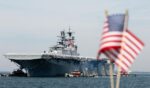 Wasp-class amphibious assault ship USS Iwo Jima returns to Naval Station Norfolk on June 6, 2026, in Norfolk, Virginia.