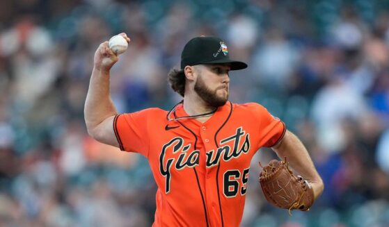 Landen Roupp of the San Francisco Giants pitches against the Chicago Cubs in the top of the first inning at Oracle Park on June 12, 2026, in San Francisco, California.