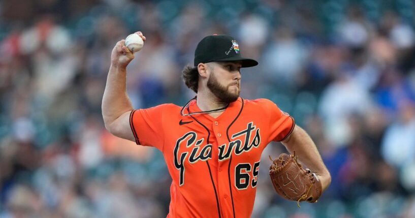 Landen Roupp of the San Francisco Giants pitches against the Chicago Cubs in the top of the first inning at Oracle Park on June 12, 2026, in San Francisco, California.